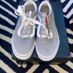 Grey Vans.